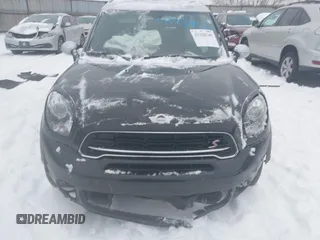 2016 MINI Countryman S with VIN WMWZC3C56GWT11105, listed as a IAAI auction lot 41228246 with 102,971 mi miles and . Bid and sale history available at DreamBid. Image 12.