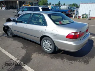 1999 Honda Accord LX with VIN JHMCG5545XC028563, listed as a IAAI auction lot 42461054 with 212,100 mi miles and . Bid and sale history available at DreamBid. Image 3.