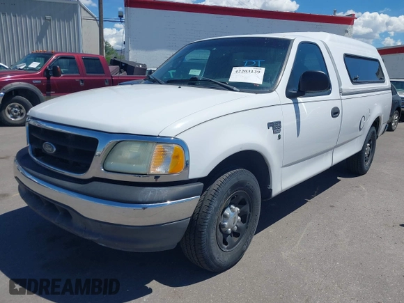 2002 Ford F-150 XL with VIN 2FTPF17Z02CA13589, listed as a IAAI auction lot 42203139 with 209,675 mi miles and . Bid and sale history available at DreamBid. Image 2.