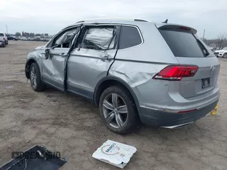 2020 Volkswagen Tiguan SE with VIN 3VV2B7AX6LM026760, listed as a IAAI auction lot 41652292 with 63,925 mi miles and . Bid and sale history available at DreamBid. Image 3.