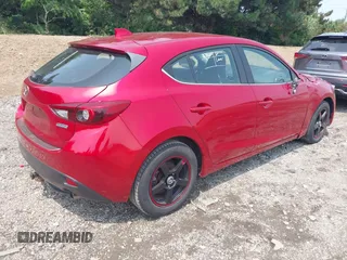 2014 Mazda 3 S Grand Touring with VIN JM1BM1M31E1150000, listed as a IAAI auction lot 42470302 with 186,187 mi miles and . Bid and sale history available at DreamBid. Image 4.