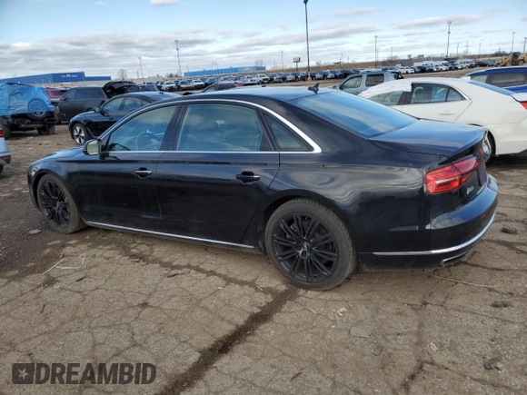 2015 Audi A8 L 4.0T with VIN WAU32AFD3FN036507, listed as a Copart auction lot 49121635 with 77,257 mi miles and Salvage Title. Bid and sale history available at carsss.com. Image 2.