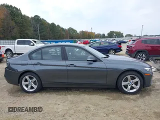 2014 BMW 3 Series 328d xDrive with VIN WBA3D5C59EKX96701, listed as a IAAI auction lot 40716972 with 163,775 mi miles. Bid and sale history available at carsss.com. Image 13.