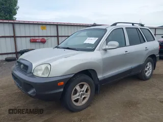 2003 Hyundai Santa Fe GLS z VIN KM8SC73DX3U357525, wystawiony jako IAAI lot #42436777 z przebiegiem 228 844 mil mil oraz . Historia ofert i sprzedaży dostępna na DreamBid. Obrazek 2.