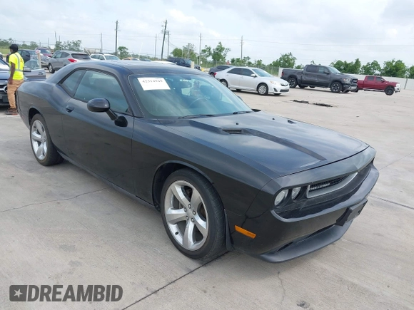 2012 Dodge Challenger SXT Plus z VIN 2C3CDYAG2CH281069, wystawiony jako IAAI lot #42314949 z przebiegiem 167 592 mil mil oraz . Historia ofert i sprzedaży dostępna na DreamBid. Obrazek 1.