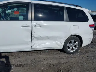 2014 Toyota Sienna LE AAS with VIN 5TDKK3DC6ES489789, listed as a IAAI auction lot 41899933 with 81,090 mi miles and . Bid and sale history available at DreamBid. Image 6.