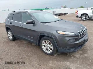 2016 Jeep Cherokee Latitude z VIN 1C4PJLCB8GW370078, wystawiony jako IAAI lot #42124707 z przebiegiem 176 273 mil mil oraz . Historia ofert i sprzedaży dostępna na DreamBid. Obrazek 1.