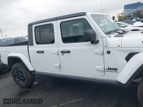 2022 Jeep Gladiator Willys with VIN 1C6HJTAG1NL148524, listed as a IAAI auction lot 41507693 with 42,004 mi miles and . Bid and sale history available at DreamBid. Image 13.