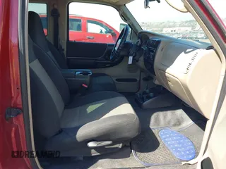 2003 Ford Ranger XL Fleet with VIN 1FTZR15EX3TA44419, listed as a IAAI auction lot 41820910 with 164,877 mi miles. Bid and sale history available at carsss.com. Image 5.