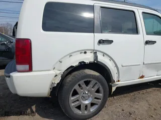 2007 Dodge Nitro R/T with VIN 1D8GU58687W720700, listed as a IAAI auction lot 41802485 with 203,575 mi miles. Bid and sale history available at carsss.com. Image 6.