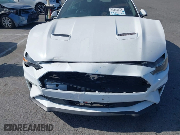 2018 Ford Mustang EcoBoost Premium z VIN 1FATP8UH8J5111364, wystawiony jako IAAI lot #42261261 z przebiegiem 102 703 mil mil oraz . Historia ofert i sprzedaży dostępna na DreamBid. Obrazek 6.