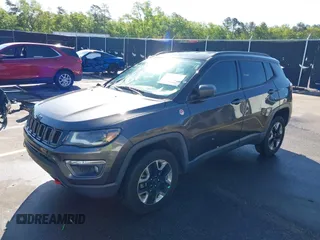 2018 Jeep Compass Trailhawk with VIN 3C4NJDDB3JT231923, listed as a IAAI auction lot 41929198 with 129,001 mi miles and . Bid and sale history available at carsss.com. Image 17.