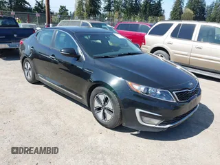 2013 Kia Optima Hybrid EX with VIN KNAGM4AD5D5049552, listed as a IAAI auction lot 42052478 with 175,388 mi miles. Bid and sale history available at carsss.com. Image 1.