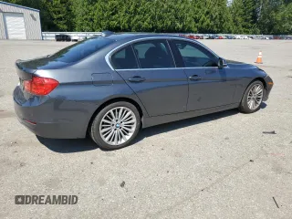 2015 BMW 3 Series 328i xDrive with VIN WBA3B3C5XFJ985147, listed as a Copart auction lot 59819905 with 113,492 mi miles and Salvage title. Bid and sale history available at DreamBid. Image 3.