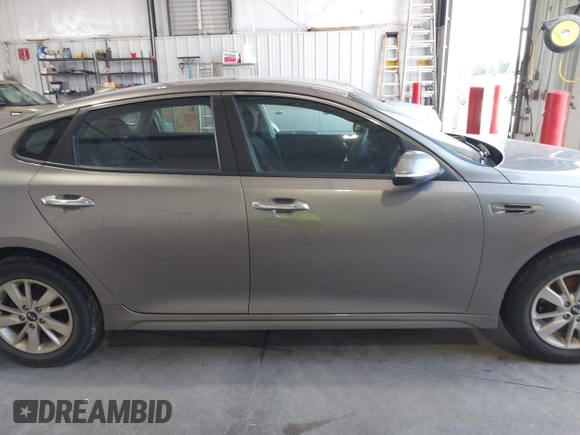 2018 Kia Optima S with VIN 5XXGT4L35JG209561, listed as a IAAI auction lot 42526577 with 161,906 mi miles and . Bid and sale history available at DreamBid. Image 13.