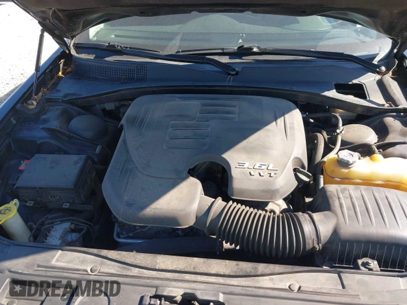 2015 Chrysler 300 Limited with VIN 2C3CCARG9FH838420, listed as a IAAI auction lot 41684228 with 242,316 mi miles. Bid and sale history available at carsss.com. Image 10.