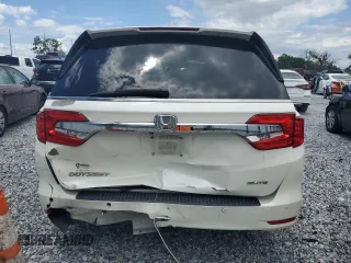 2018 Honda Odyssey Elite z VIN 5FNRL6H9XJB064148, wystawiony jako Copart lot #56214025 z przebiegiem 117 627 mil mil oraz Szkoda całkowita • Salvage title. Historia ofert i sprzedaży dostępna na DreamBid. Obrazek 6.