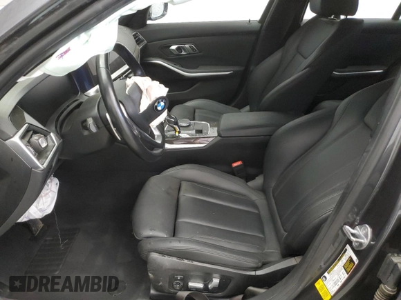 2019 BMW 3 Series 330i with VIN WBA5R1C56KFH04731, listed as a Copart auction lot 56854405 with 99,999 mi miles and Clean title. Bid and sale history available at DreamBid. Image 7.