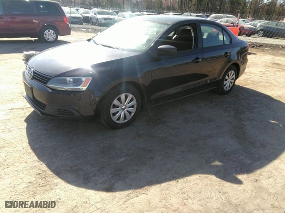 2014 Volkswagen Jetta Sedan S with VIN 3VW2K7AJ5EM310715, listed as a IAAI auction lot 41843290 with 257,801 mi miles. Bid and sale history available at carsss.com. Image 2.