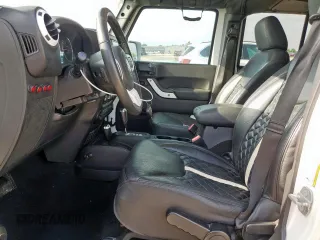 2015 Jeep Wrangler Unlimited Sport with VIN 1C4BJWDG9FL759012, listed as a Copart auction lot 61002465 with 101,395 mi miles and Salvage title. Bid and sale history available at DreamBid. Image 7.