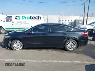 2013 Ford Fusion SE Hybrid with VIN 3FA6P0LU4DR325699, listed as a IAAI auction lot 41677237 with 129,004 mi miles. Bid and sale history available at carsss.com. Image 14.