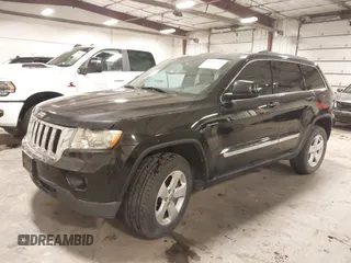2012 Jeep Grand Cherokee Laredo with VIN 1C4RJFAG6CC266144, listed as a IAAI auction lot 41497163 with 233,755 mi miles. Bid and sale history available at carsss.com. Image 18.