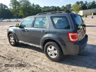 2009 Ford Escape XLS with VIN 1FMCU02739KD07929, listed as a Copart auction lot 64861745 with 144,914 mi miles and Clean title. Bid and sale history available at DreamBid. Image 2.