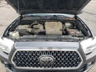 2018 Toyota Tacoma SR with VIN 5TFCZ5AN1JX147799, listed as a Copart auction lot 54337455 with 189,899 mi miles and Salvage Title. Bid and sale history available at DreamBid. Image 11.