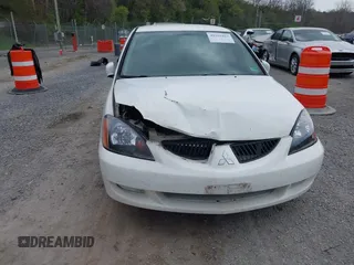 2005 Mitsubishi Lancer ES with VIN JA3AJ26E15U011460, listed as a IAAI auction lot 41955427 with 343,559 mi miles. Bid and sale history available at carsss.com. Image 12.