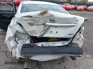 2014 Nissan Altima SV with VIN 1N4AL3AP7EC141832, listed as a IAAI auction lot 42019574 with 124,802 mi miles and . Bid and sale history available at carsss.com. Image 6.