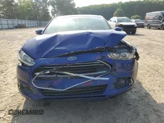 2013 Ford Fusion SE Hybrid z VIN 3FA6P0LU8DR295297, wystawiony jako Copart lot #61830065 z przebiegiem 190 096 mil mil oraz Czysty tytuł • Clean title. Historia ofert i sprzedaży dostępna na DreamBid. Obrazek 5.