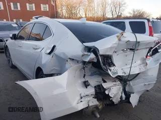 2015 Acura TLX V6 Tech with VIN 19UUB3F56FA000492, listed as a IAAI auction lot 41274442 with 95,519 mi miles. Bid and sale history available at carsss.com. Image 3.