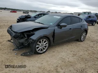 2014 Mazda 3 S Touring with VIN JM1BM1L31E1159880, listed as a Copart auction lot 86651664 with 140,337 mi miles and Salvage Title. Bid and sale history available at DreamBid. Image 1.
