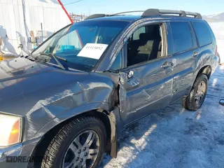 2004 Mitsubishi Endeavor XLS with VIN 4A4MN31S44E064287, listed as a IAAI auction lot 41315892 with 226,820 mi miles. Bid and sale history available at carsss.com. Image 6.