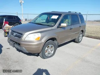 2003 Honda Pilot EX with VIN 2HKYF18513H547292, listed as a IAAI auction lot 41744101 with 236,852 mi miles. Bid and sale history available at carsss.com. Image 2.