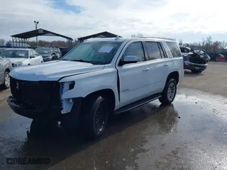 2016 Chevrolet Tahoe LS with VIN 1GNSKAKC2GR408884, listed as a IAAI auction lot 40885051 with 124,858 mi miles. Bid and sale history available at carsss.com. Image 2.