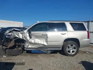 2015 Chevrolet Tahoe LT with VIN 1GNSCBKC8FR646756, listed as a IAAI auction lot 41856070 with 138,495 mi miles and . Bid and sale history available at DreamBid. Image 14.