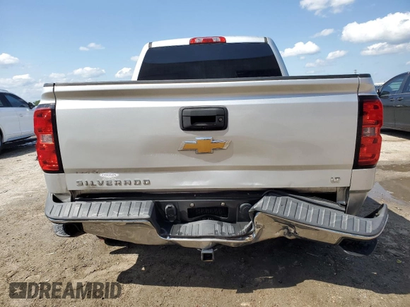 2015 Chevrolet Silverado 1500 LT with VIN 3GCUKREC9FG433906, listed as a Copart auction lot 52495785 with 99,268 mi miles and Salvage Title. Bid and sale history available at DreamBid. Image 6.