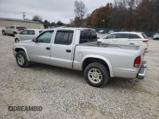 2003 Dodge Dakota SLT with VIN 1D7HL48X13S151334, listed as a Copart auction lot 82016764 with 216,281 mi miles and Salvage Title. Bid and sale history available at carsss.com. Image 2.