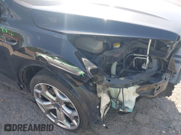 2017 Ford Escape Titanium with VIN 1FMCU0J91HUA75417, listed as a IAAI auction lot 42044170 with 116,431 mi miles. Bid and sale history available at carsss.com. Image 20.