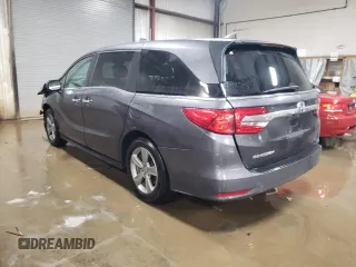 2018 Honda Odyssey EX-L with VIN 5FNRL6H71JB050444, listed as a Copart auction lot 87472554 with 102,667 mi miles and Salvage Title. Bid and sale history available at carsss.com. Image 2.