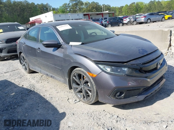 2019 Honda Civic Sport with VIN 2HGFC2F8XKH598141, listed as a IAAI auction lot 42013724 with 98,401 mi miles and . Bid and sale history available at DreamBid. Image 1.