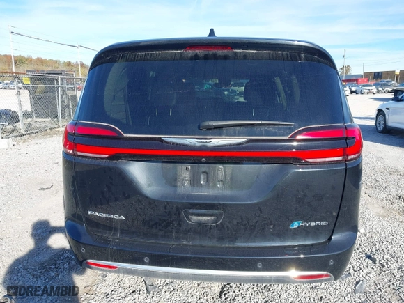 2023 Chrysler Pacifica Hybrid Touring L with VIN 2C4RC1L79PR592477, listed as a IAAI auction lot 40823333 with 8,729 mi miles. Bid and sale history available at carsss.com. Image 16.