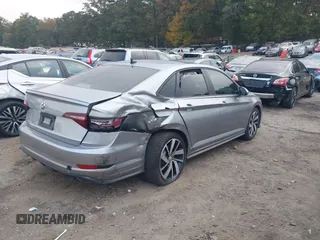 2019 Volkswagen Jetta GLI S z VIN 3VW5T7BU4KM165083, wystawiony jako IAAI lot #40729763 z przebiegiem 75 414 mil mil oraz . Historia ofert i sprzedaży dostępna na DreamBid. Obrazek 4.