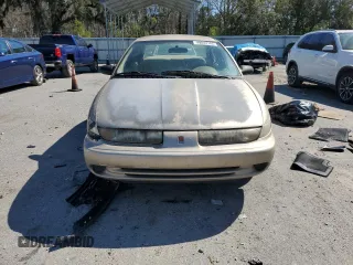 1999 Saturn SL с VIN 1G8ZK527XXZ111390, выставлен на аукционе Copart как лот 49042185 с пробегом 164 733 миль миль и Списание • Salvage title. История ставок и продаж доступна на DreamBid. Изображение 5.
