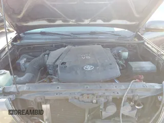 2011 Toyota Tacoma PreRunner with VIN 3TMJU4GN6BM117602, listed as a IAAI auction lot 41483053 with 209,591 mi miles and . Bid and sale history available at DreamBid. Image 10.