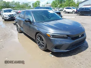 2022 Honda Civic Sport z VIN 2HGFE2F58NH560511, wystawiony jako IAAI lot #42346044 z przebiegiem 51 357 mil mil oraz . Historia ofert i sprzedaży dostępna na DreamBid. Obrazek 1.