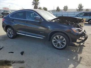 2016 BMW X4 xDrive28i with VIN 5UXXW3C50G0R22606, listed as a Copart auction lot 67657412 with 65,119 mi miles. Bid and sale history available at carsss.com. Image 4.