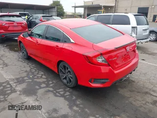 2019 Honda Civic Sport with VIN 2HGFC2F80KH538093, listed as a IAAI auction lot 42093863 with 63,349 mi miles and . Bid and sale history available at DreamBid. Image 3.