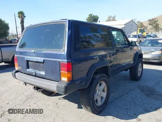 1996 Jeep Cherokee with VIN 1J4FT27S2TL156171, listed as a IAAI auction lot 41578009 with 161,095 mi miles and . Bid and sale history available at DreamBid. Image 4.
